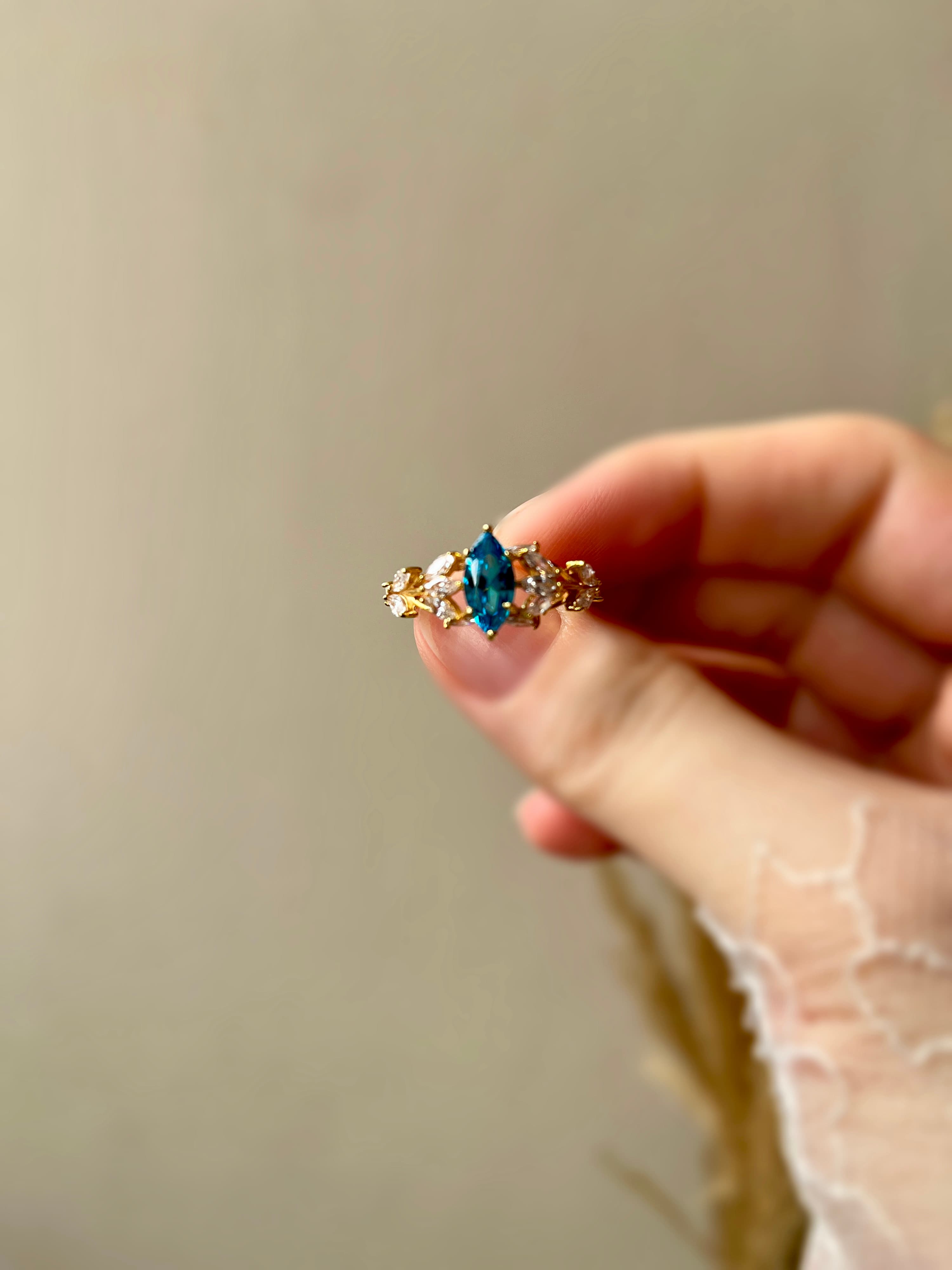 Green Marquise Cut ring, close-up view 1